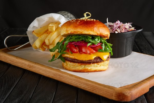 Juicy beef burger with lingonberry sauce