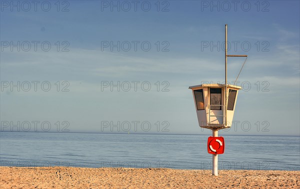 Rescue tower on the empty beach of the seaside resort of Dahme