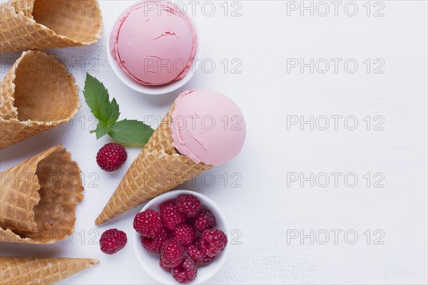 Raspberries ice cream cones table. Resolution and high quality beautiful photo