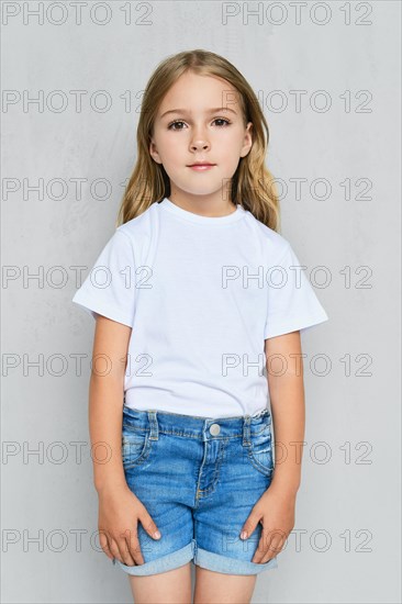Little child girl in white t-shirt