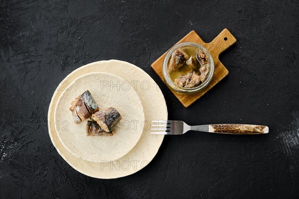 Top view of canned mackerel on a plate