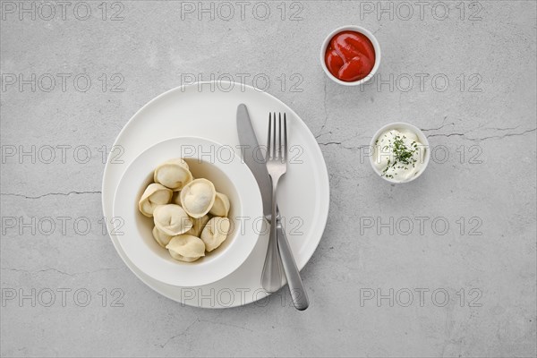 Top view of frozen semifinished dumplings stuffed with beef meat