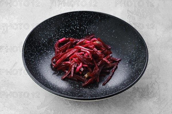 Garnish to the main dish -marinated slices of beetroot