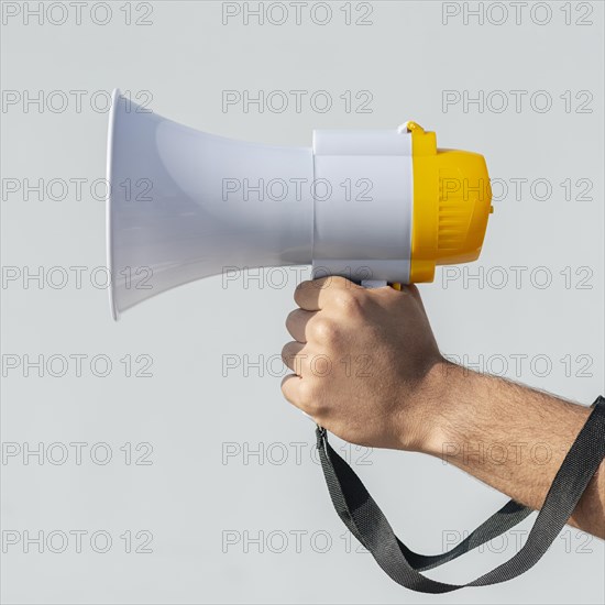 Protester holding megaphone demonstration