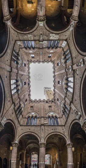 View of the Torre del Mangia from the courtyard