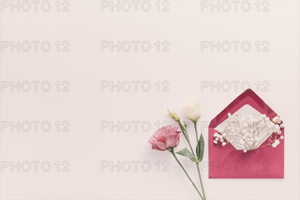 Red envelope with flower branches table