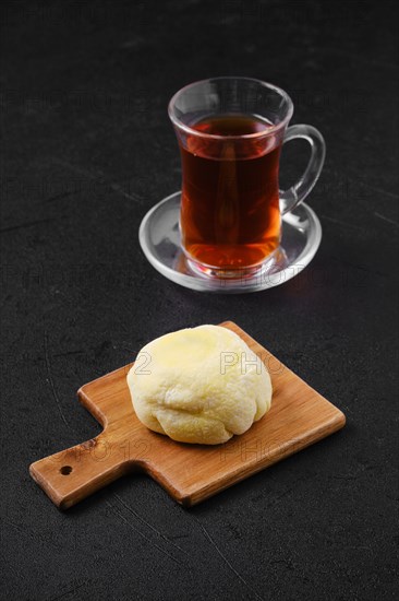 Sweet dessert mochi with banana and chocolate with fruit tea