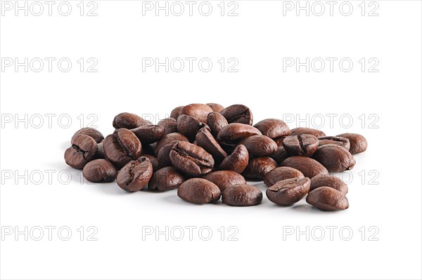 Coffee beans scattered on white background