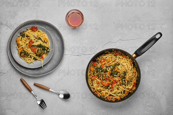 Overhead view of spaghetti with spinach