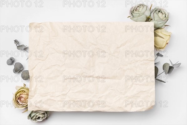 Flat lay bouquet paper roses with copy space