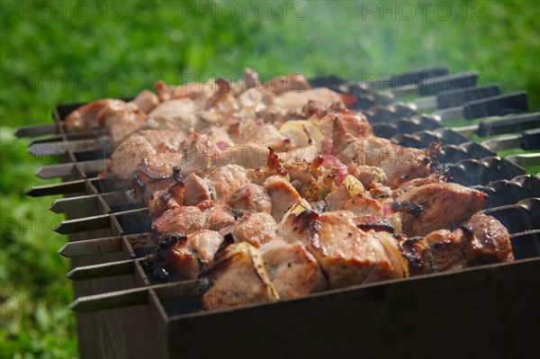 Process of cooking shashlik from pickled meat outdoor