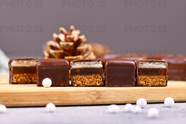 Traditional German sweets called Dominosteine. Food sold around Christmas season consisting of gingerbread