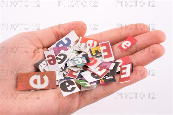 Torn Newspaper Titles on hand