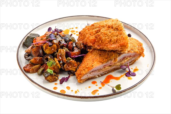 Cutlet with stuffing in breading with fried eggplant