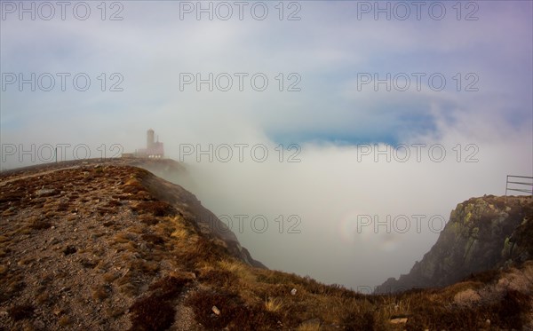 View from the top of the mountain in the fog