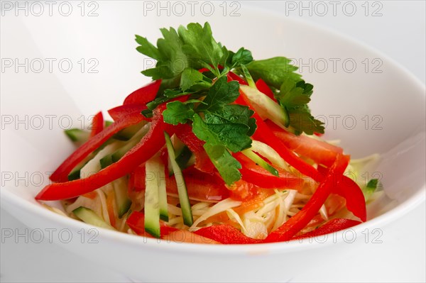 Closeup view of spring salad with paprika