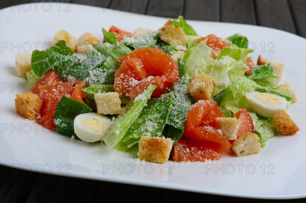 Close up photo of salad with quail egg