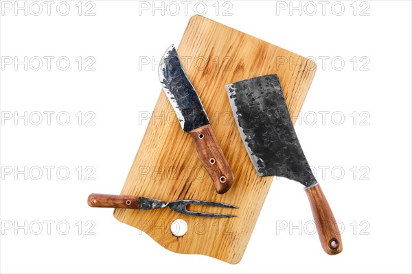Top view of forged butcher set isolated on white