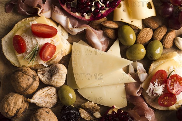 Delicious cheese with tomatoes composition table