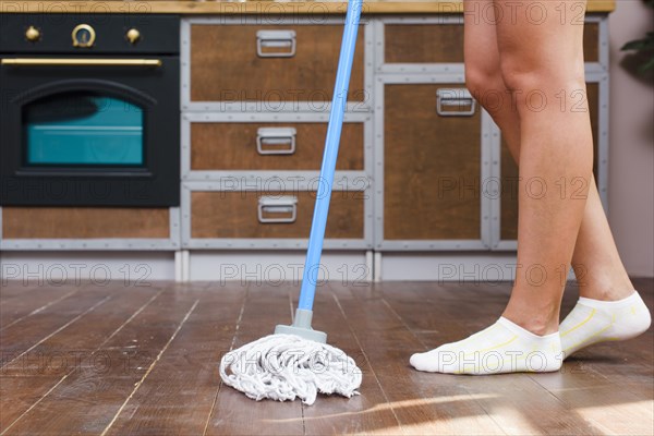 Low section cleaner mopping floor kitchen