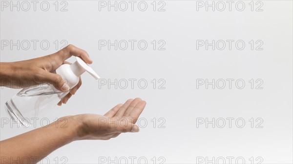 Person using hand sanitizer gel copy space. Resolution and high quality beautiful photo