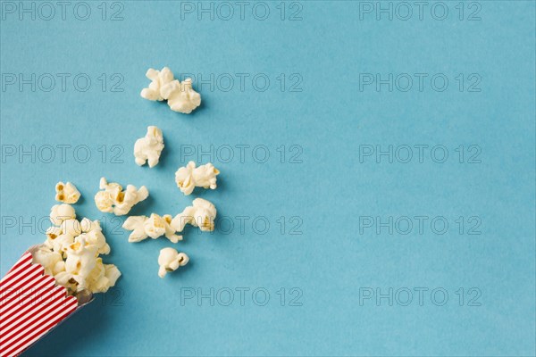 Top view popcorn composition blue background with copy space. Resolution and high quality beautiful photo