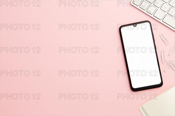Working woman pink desk with phone and copy space. Resolution and high quality beautiful photo