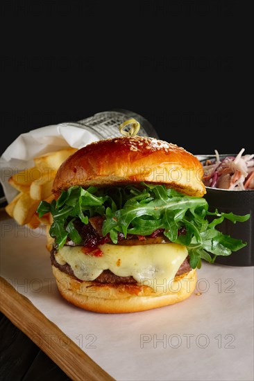 Juicy beef burger with lingonberry sauce