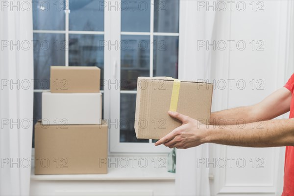 Crop hands with parcels