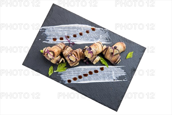 Eggplant stuffed with soft cheese and garlic isolated on white background