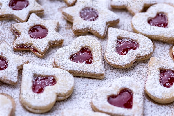 Freshly baked Spitzbuben in the shape of a heart