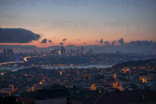 Istanbul cityscape below clouds during the evening