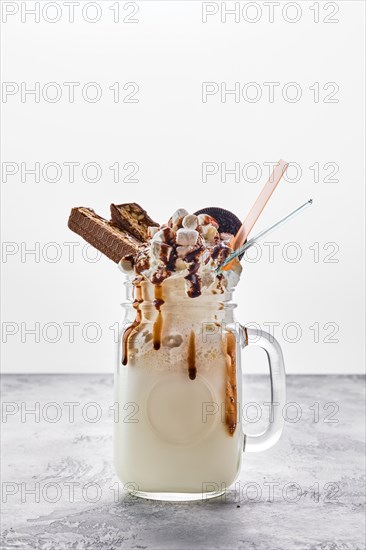 Milkshake with vegetable whipped cream foam