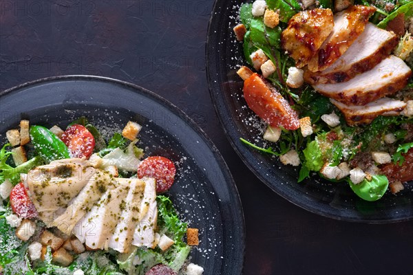 Salad with fried chicken and turkey fillet