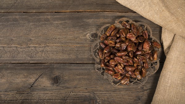 Dates fruit plate wooden table