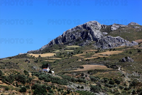 Small chapel in front of the Kedros Mountains in the south of the island near the village of Lefkogia