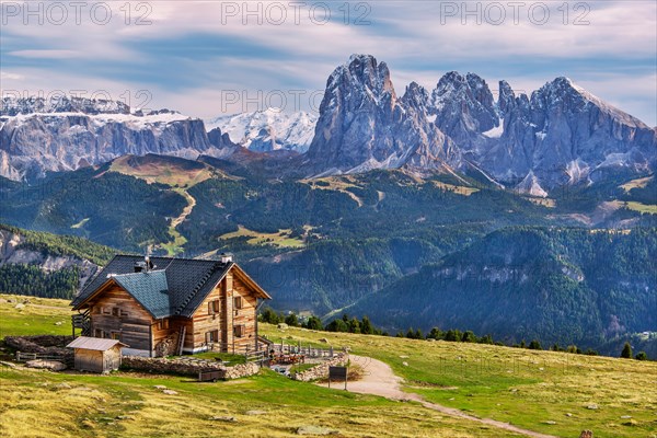 Raschoetzhuette on the Raschoetzalm in front of the Sella Group 3152m