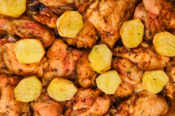 Top view of baked chicken and potato