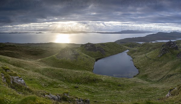 Sunbeams through sky