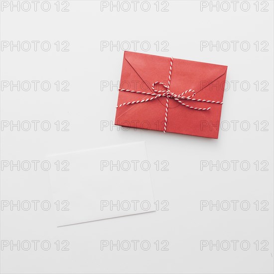 White paper with red envelope. Resolution and high quality beautiful photo