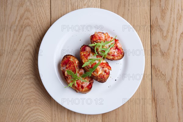 Top view of roasted bread with ham