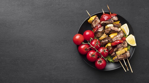Top view delicious kebab with tomatoes copy space. Resolution and high quality beautiful photo