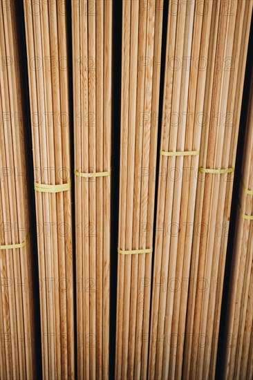 Large rectanguler wood panels stacked up together in display