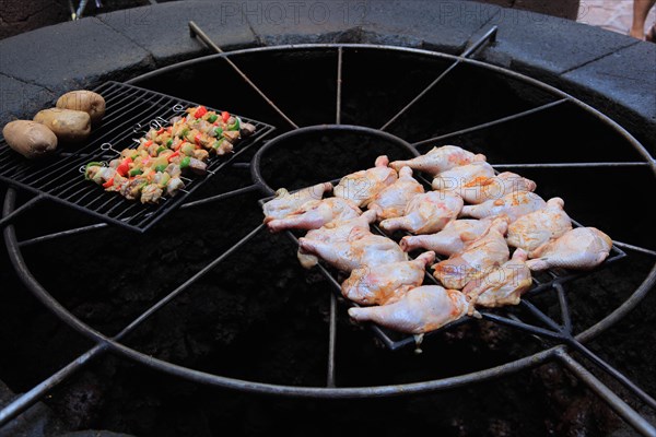 Barbecue in El Diablo restaurant heated with the heat of the volcano. Timanfaya National Park