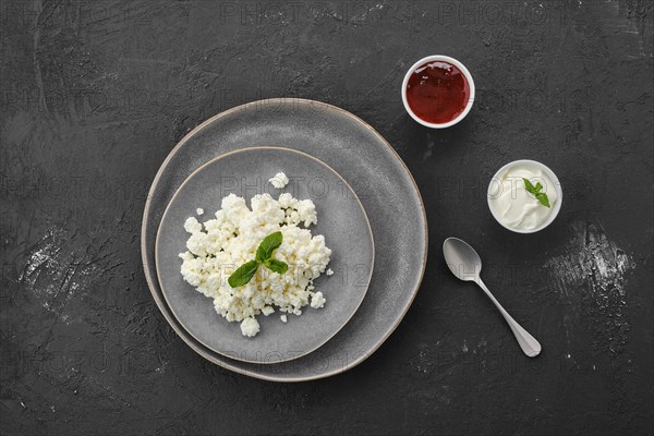 Fresh homemade cottage cheese on a plate