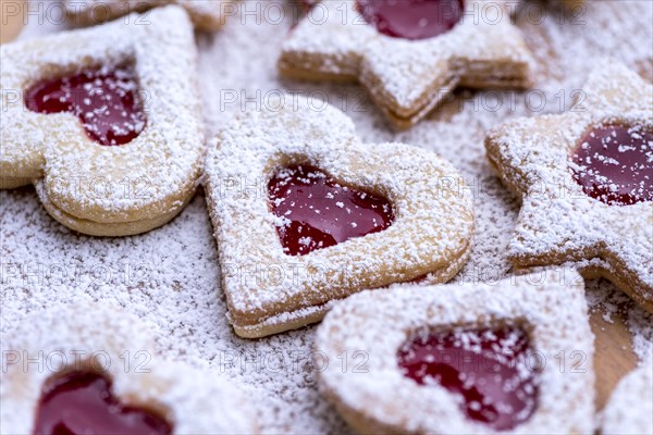 Freshly baked Spitzbuben in the shape of a heart