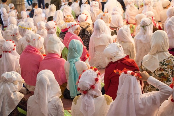 Small girls with hijab in a big mosque