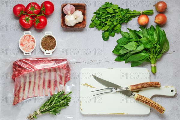 Vacuum sealed lamb ribs with ingredients for cooking