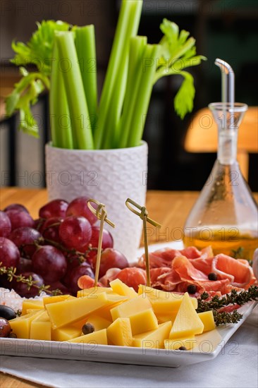 Close up view of set of various appetizers for wine