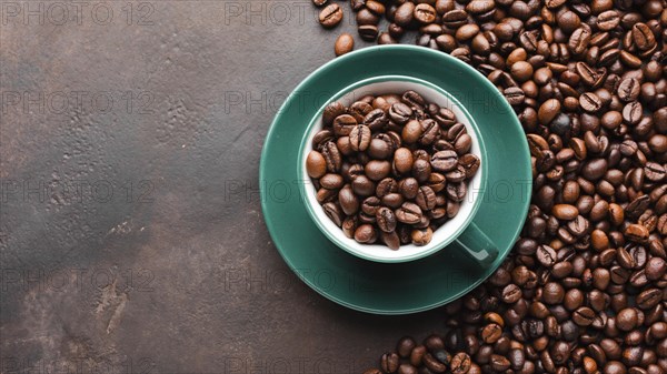 Cup filled with organic coffee beans